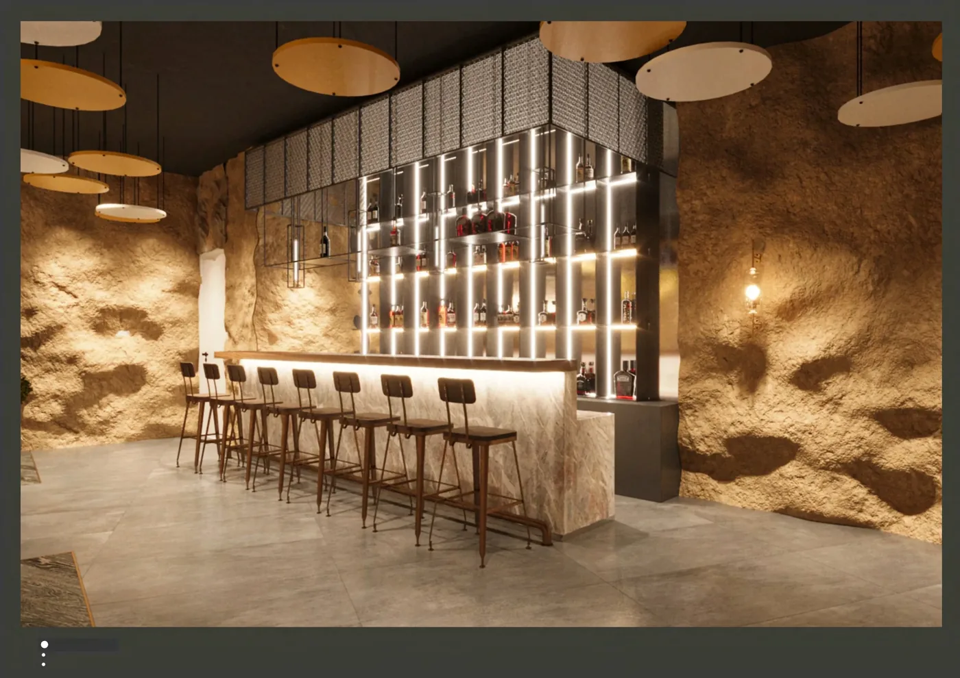 Hospitality bar visual with a stone-faced counter, rear display and stools