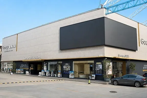 Commercial showroom exterior with GEORGE signage and display windows