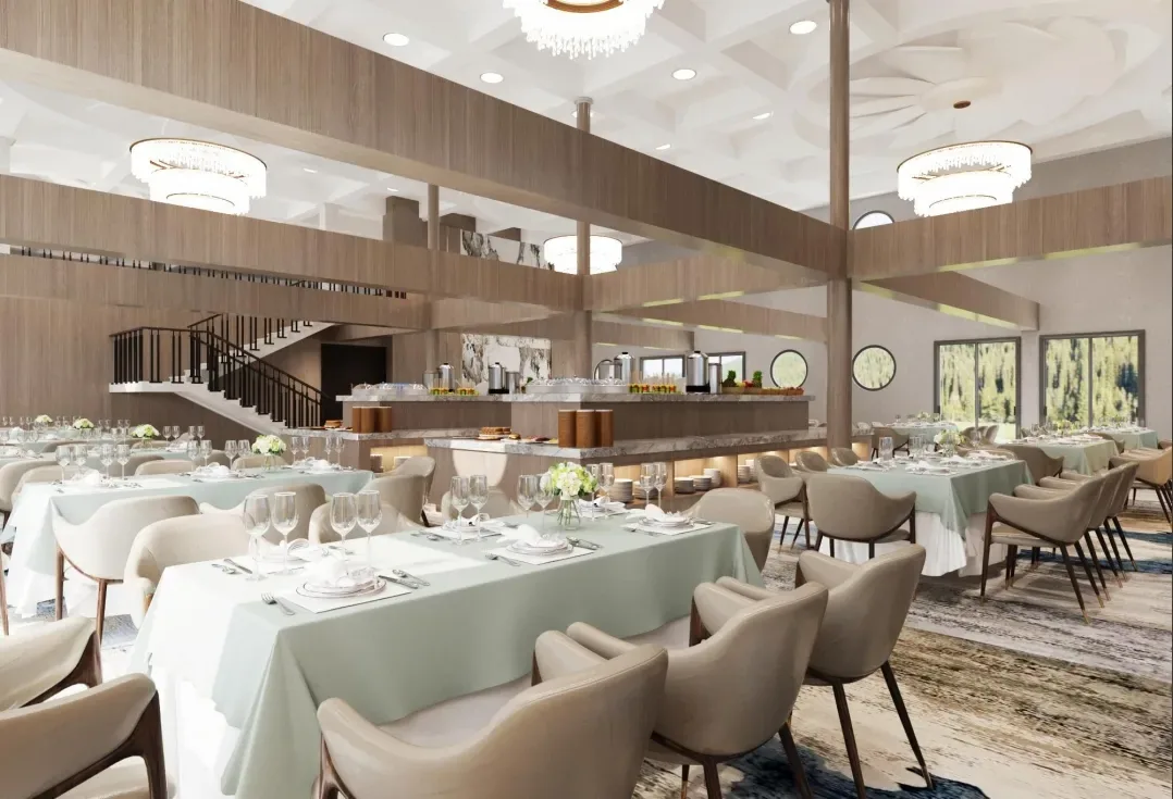 Large hotel dining visual with repeated dining tables and upholstered chairs