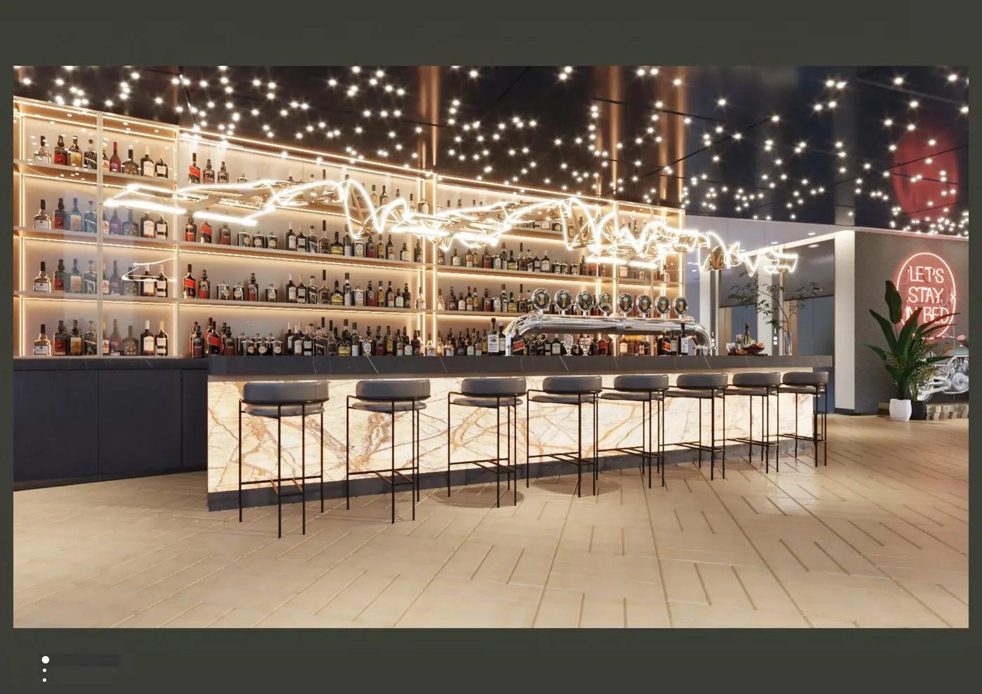Large bar visual with a long counter, illuminated back bar and stools