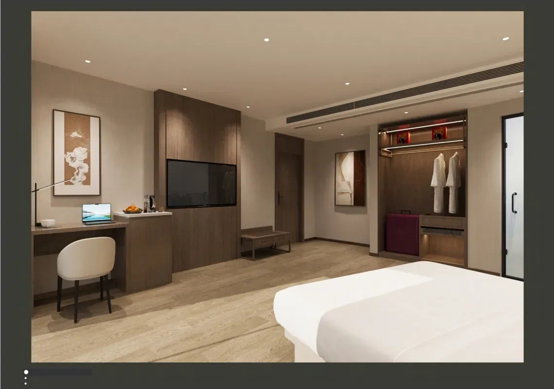 GEORGE Group hotel-room visual with a bed, bedside furniture, desk and open wardrobe or minibar area