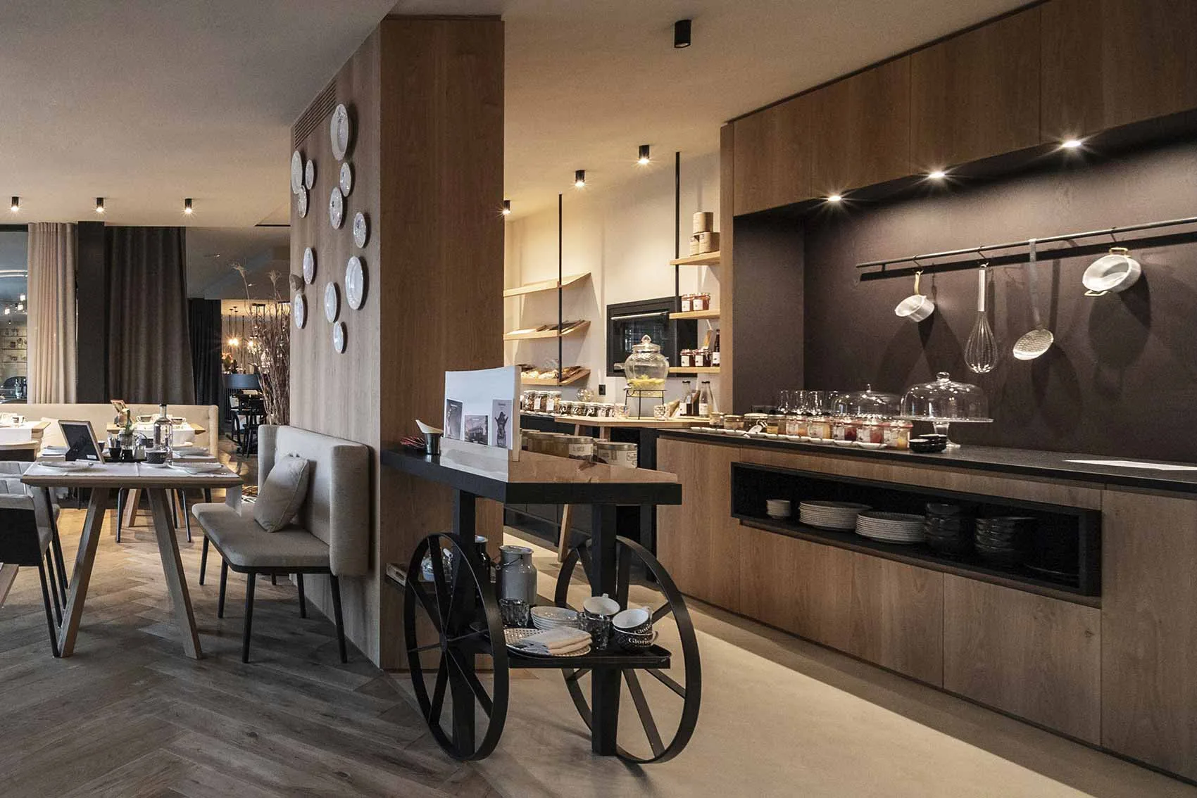 Restaurant buffet counter with dining tables and display objects