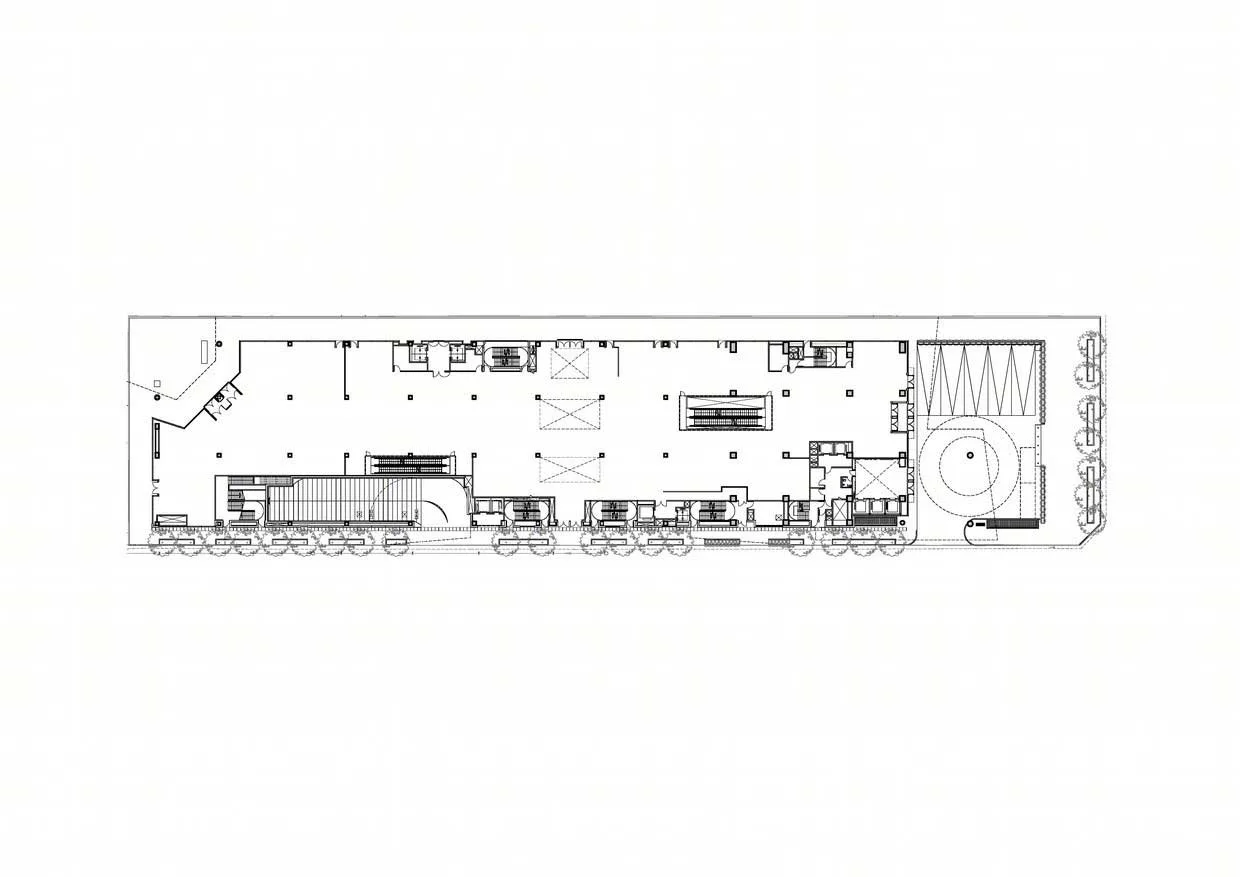 Public project plan drawing showing a long podium layout and circular entrance zone