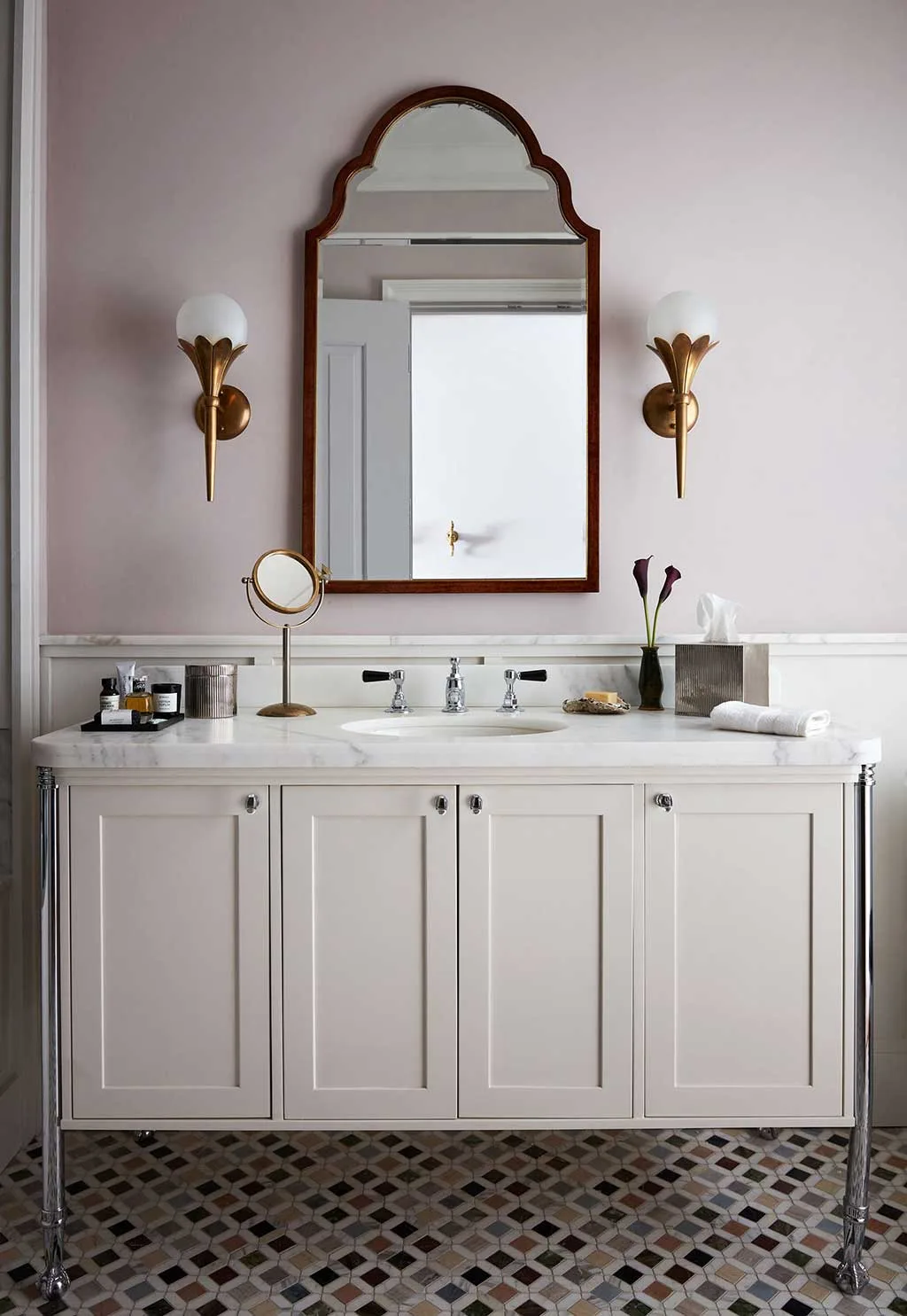 Guest bathroom vanity with twin basins, mirror and wall lights